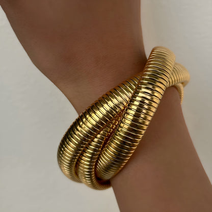 Violette – Gedraaide gouden statement armband