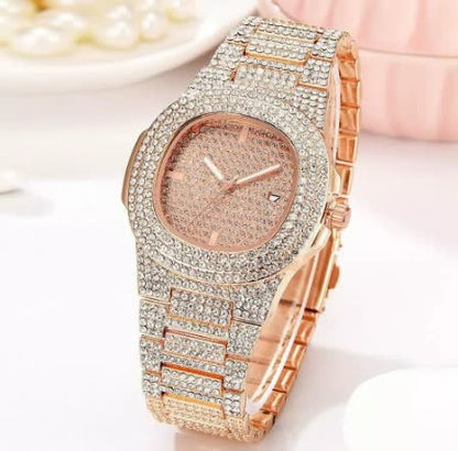 Elegante gouden horloge met subtiele parel